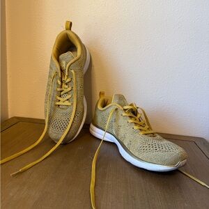 APL women’s size 11 gold athletic shoes. Used good condition